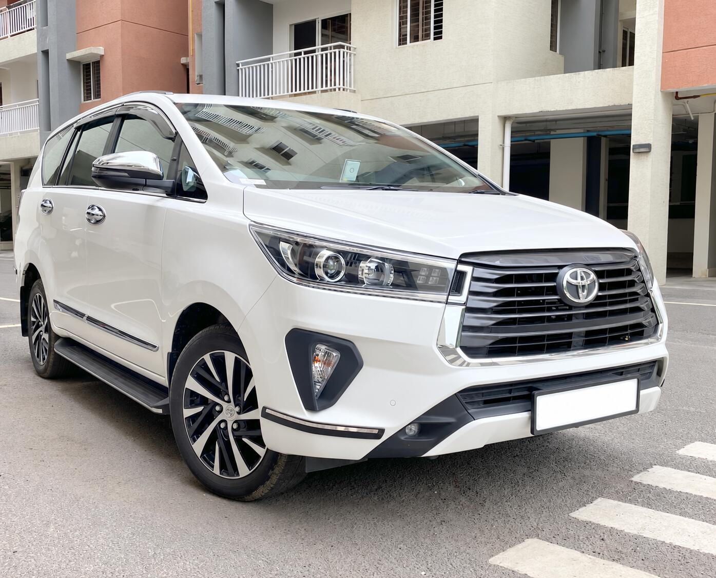 Toyota Innova Crysta SUV passenger car for family tours